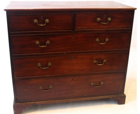 A late Georgian mahogany chest of drawers, early 19th Century 
The rectangular top with moulded edges over-hanging two short 