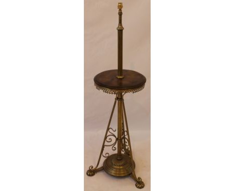 A late Victorian brass oil lamp pedestal
Now converted to electric, the brass column with central circular oak tier above the
