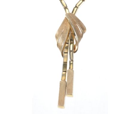 A stylish circa 1970's gold collar necklace
The chunky brick link chain to satinised tie motif and twin drops, stamped 585, l