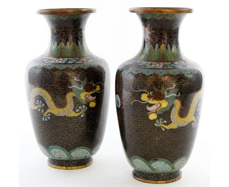 A pair of Chinese cloisonné 'dragon' vases, in the manner of Lao Tian, Late Qing Dynasty (1644-1922)
Of tapered ovoid form, e