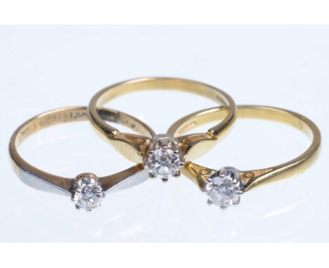 Three diamond set single stone rings
The first set with an old round cut diamond to shaped shoulders and plain 18ct gold band