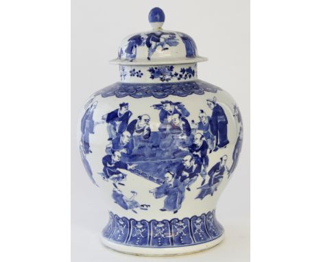 A Chinese blue and White Kangxi style vase, 19th Century 
Of baluster form, rising from a splayed base and extending to a sho