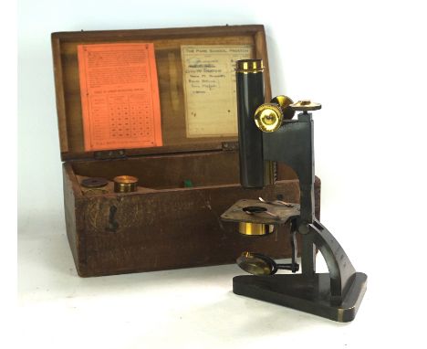 A mid 20th Century R & J Peck Ltd of London students microscope
Complete with one extra lens, fitted in hardwood case.