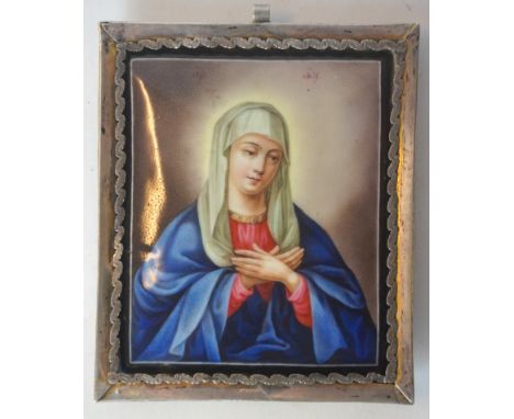 A 19th Century Italian enamel plaque
Depicting Mary, with white metal frame, the back with various writing (back panel af), l