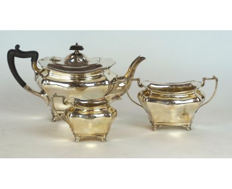 An Edward VII hallmarked silver Art Nouveau three piece tea service
Comprising teapot, twin handled sugar bowl, milk jug, eac