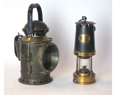 A British Rail brass and tin railway lantern
Together with a Patterson Lamps Ltd Gateshead on Tyne miners lamp. 
