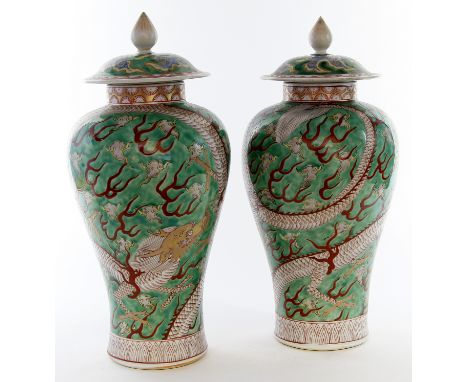 A pair of Chinese Wucai style vases, Late Qing Dynasty (1644-1912)
Each of shouldered ovoid form, rising to a short upper rim