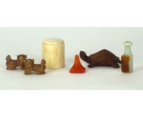 A collection of Chinese carvings and collectible items 
To include an agate uncut seal, a simulated jade cheroot holder, an i