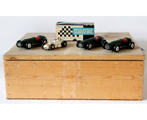 A large quantity of Scalextric and Fleischmann items
Comprising three green tinplate racing cars, two No. 3 and one No. 9, ot