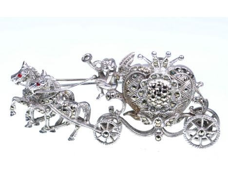 A Bimesa silver marcasite brooch watch 
In the form of a fairy tale carriage and horse, with winged cherub driver, the carria