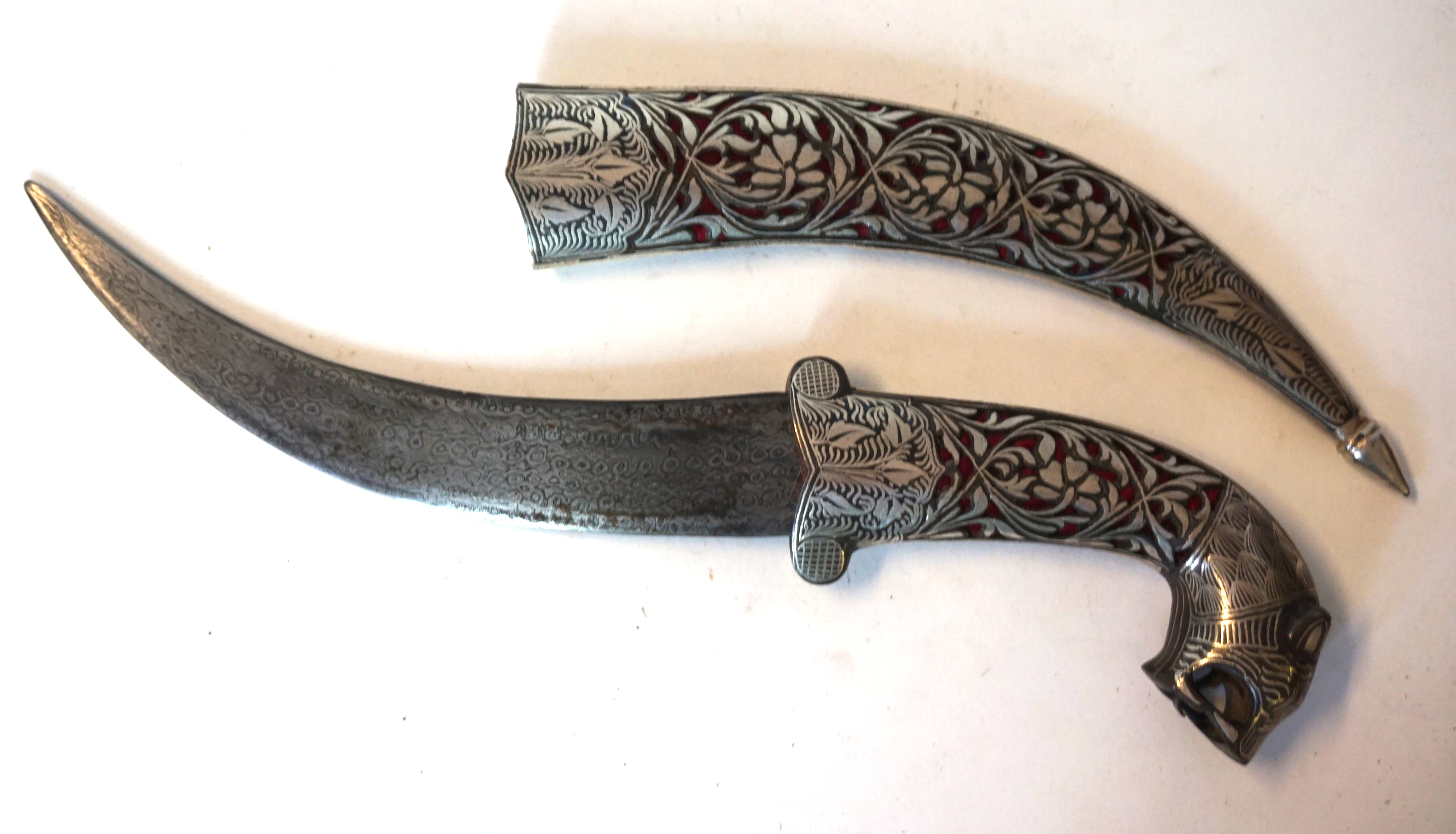 An late 19th Century ornamental Turkish knife The 17cm curved blade