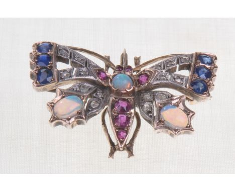 A multi gem set butterfly brooch, early 20th Century
A pierced openwork wings, set with diamonds, sapphires and opals, to the