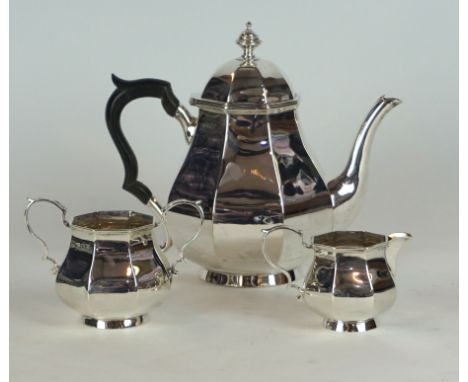 Edward VII hallmarked silver Harlequin three piece tea service 
Having panelled decoration, produced Atkin Brothers & Elkingt