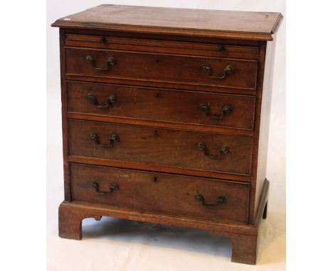 An early George III mahogany bachelor's chest of diminutive proportions
The rectangular top with moulded borders above a brus