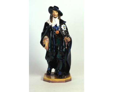 A Royal Doulton figurine HN2084 King Charles
Designed by Charles Noke, height 44cm (lacking stick).