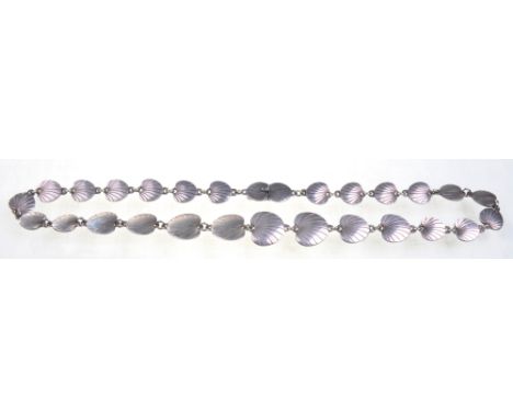 A Danish sterling silver necklace by Eiler & Marloe
In the form of graduated stylised lily pad links, to hidden push clasp, s