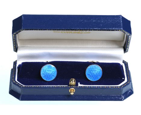 A pair of early 20th Century guilloche enamel cufflinks
The two circular plaques having decorative blue enamel to chain links
