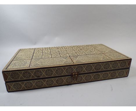 A Modern North African Inlaid Folding Chess Box with Parquetry Interior. 