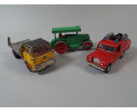 A Collection of Three Dinky Toy Cars Comprising of Land Rover Fire engine, Ayeling-Barford Road Roller and A Bedford Tipper. 