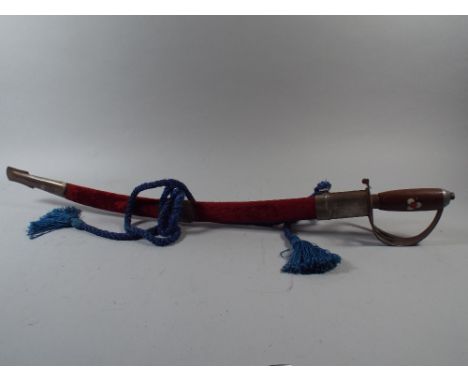 A 20th Century Indian Sword with Inlaid Handle and Velvet Covered Scabbard. 