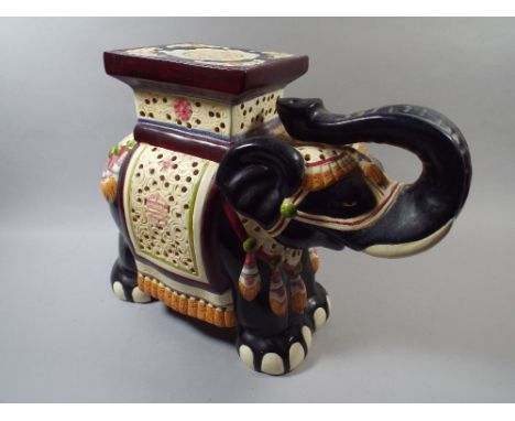 A Ceramic Elephant Stool.