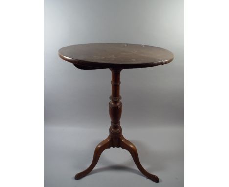 An Early 20th Century Elm Tip Top Tripod Table. 