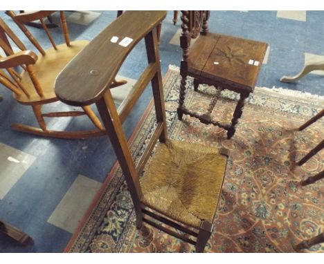 A Ladder Backed Rush Seated Hall Chair.