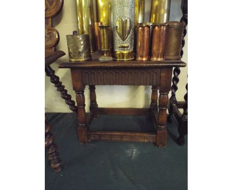 An Early 20th Oak Topped Joint Stool.