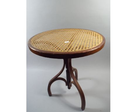 A Cane Top Bent Wood Tripod Table. 