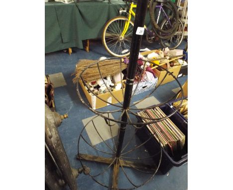 A Metal Floor Standing Planter with Three Tiers. 