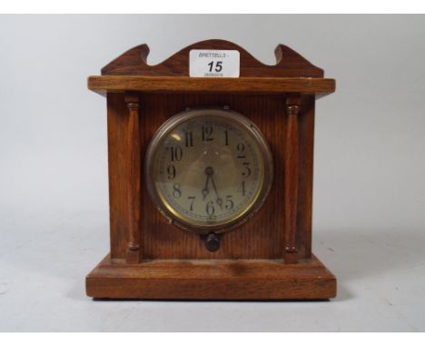 An Edwardian Oak Cased Mantle Clock. 