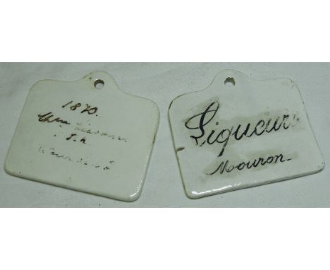 2 CERAMIC WINE BIN LABELS 