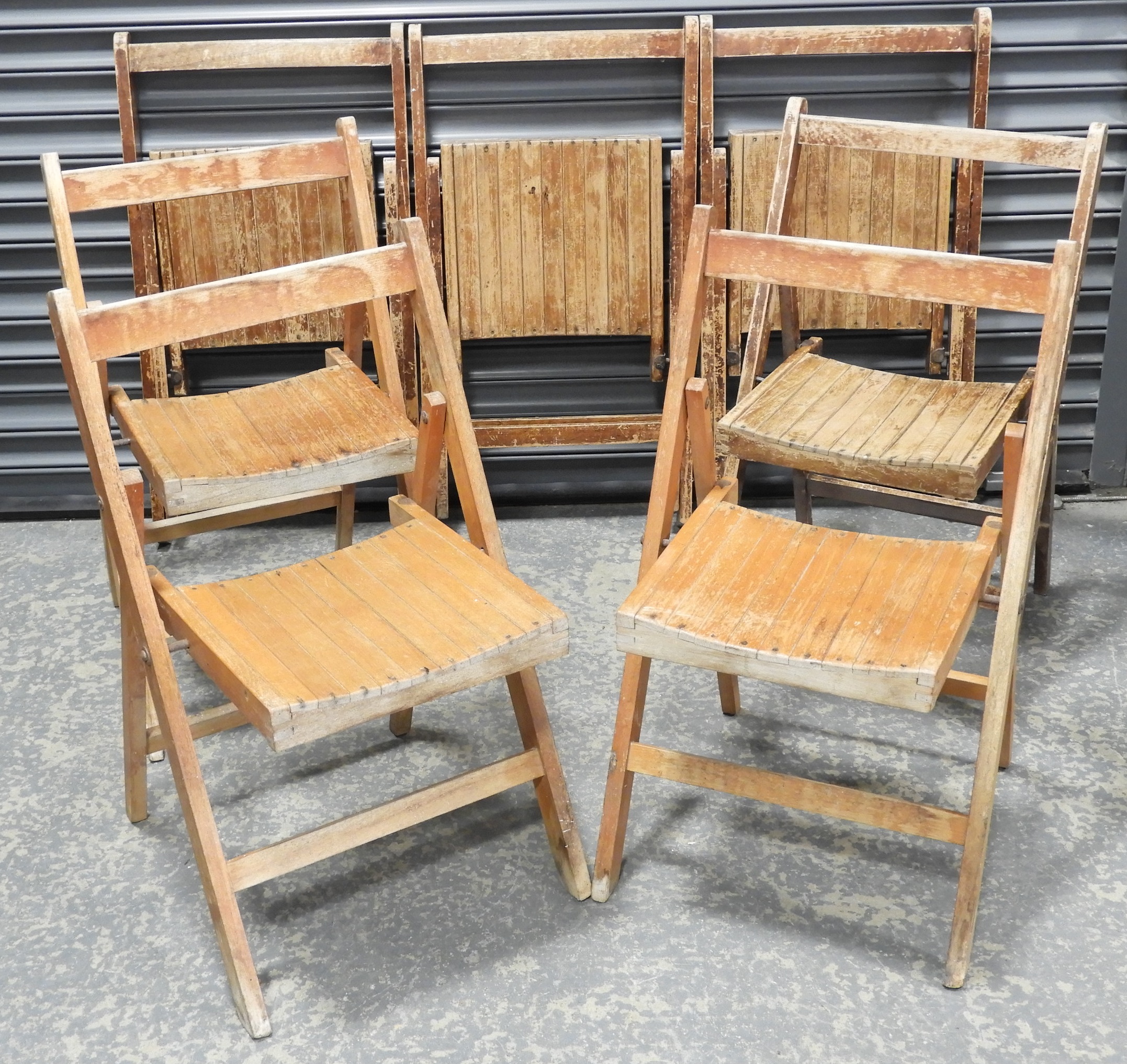 7 FOLDING WOODEN COMMUNITY HALL CHAIRS