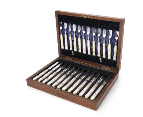 A CASED SET OF TWELVE GEORGE V SILVER FRUIT KNIVES AND TWELVE FORKS, Sheffield 1913, with mother of pearl handles, crested