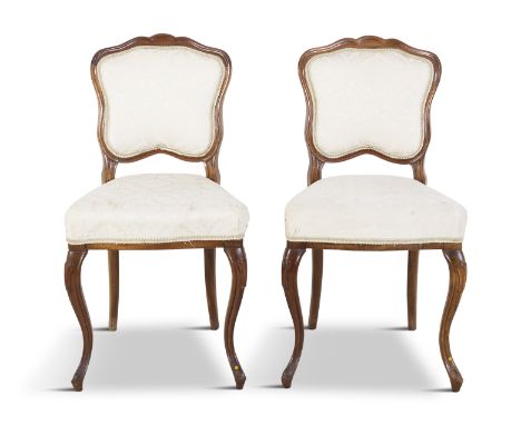 A PAIR OF VICTORIAN GOLDEN BEECH FRAMED LOW SEAT TALL BACK SIDE CHAIRS, the panel back with pierced, carved foliated crest, c