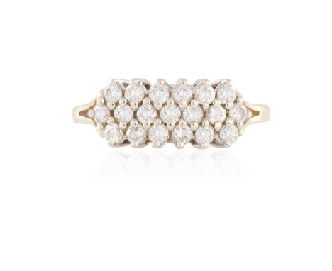 A DIAMOND DRESS RING, set with three rows of round brilliant-cut diamonds, mounted in gold, ring size R