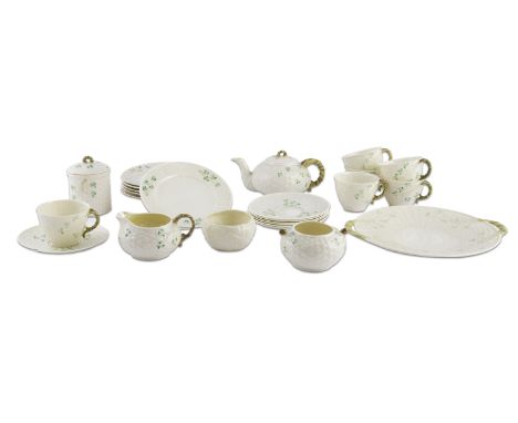 A SIX PIECE BELEEK TEA SERVICE WITH SHAMROCK PATTERN, comprising:- teapot- 6 cups- 6 saucers- 6 side plates- cream jug- sugar