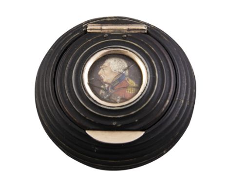 ***ADDITIONAL LOT ***A STAINED IVORY CIRCULAR SNUFF BOX, c.1800, of circular form, the cover inset with portrait of King Geor