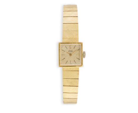 A LADY'S MANUAL WRISTWATCH BY GIRARD PERREGAUX CIRCA 1970, the square gold-coloured dial with baton markers and sword hands, 