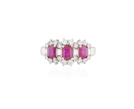 A RUBY AND DIAMOND RING, each rectangular-cut ruby within a surround of round brilliant-cut diamonds and between princess-cut