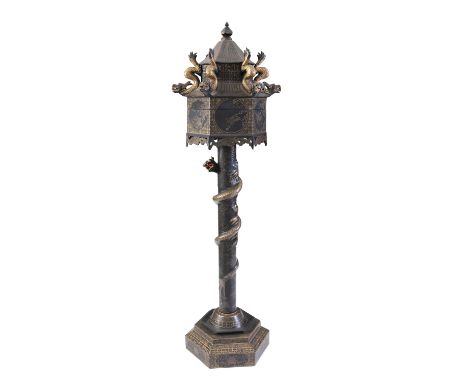 AN AESTHETIC PERIOD GILT LACQUERED TORCHERE STAND, 19TH CENTURY, of pagoda design. The detachable top with angled finial over