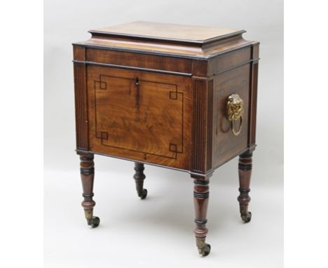 A 19TH CENTURY MAHOGANY CELLARET, converted to a sewing table, hinged caddy top, fitted brass mask ring handles raised on rin