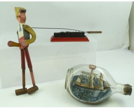 A MASTED SHIP-IN-A-"HAIG" DIMPLE BOTTLE, a "Britains" cast and painted metal STEAM RAILWAY ENGINE, from the "British Empire E