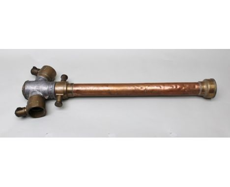 A WARWICKSHIRE FIRE BRIGADE STAND PIPE with twin outlets, copper and brass construction, dated 1939, 96cm high 