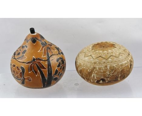 TWO DECORATIVE GOURD BOXES, one carved with Inca and Lama work, the other palm trees and turtles, tallest 12cm high (ex. Feli