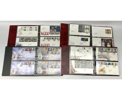 Queen Elizabeth II First Day Covers, mostly with printed addresses and many with special postmarks, housed in four ring binde