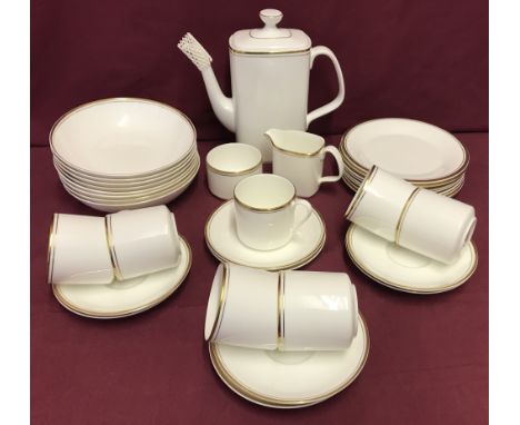 A quantity of first quality Royal Doulton "Gold Concord" bone china coffee ware H5049.  Comprising: Coffee pot, sugar bowl, c