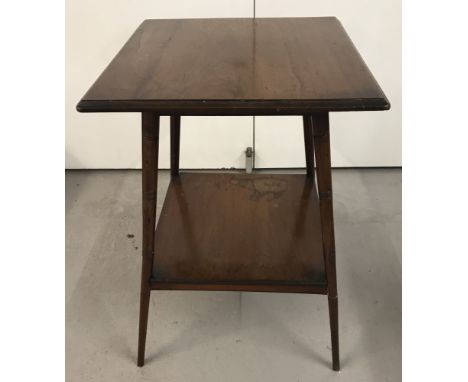 A vintage dark wood 2 tier occasional table with splayed legs.  Banded decoration to legs.  Total height approx. 67cm.