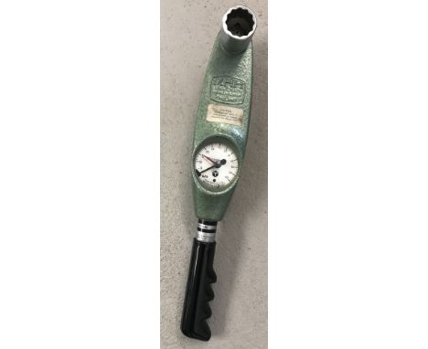 A vintage MHH Torqueleader with black plastic grip handle .  