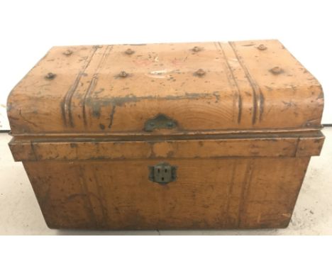A vintage metal tin trunk with painted initials W.L. to top.  Approx. 67cm wide x 43cm tall.